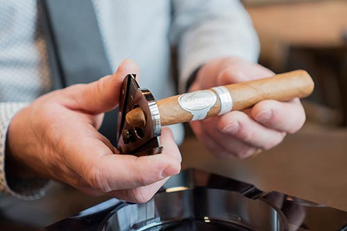 Cutting A Cigar